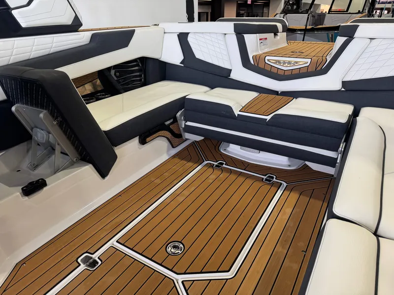 Slide: The Image of Interior of 2023 Nautique Super Air Nautique G23 with luxurious seating. - 15