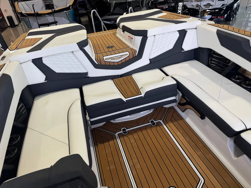 Slide: The Image of Interior of 2023 Nautique Super Air Nautique G23 with luxurious seating design. - 16
