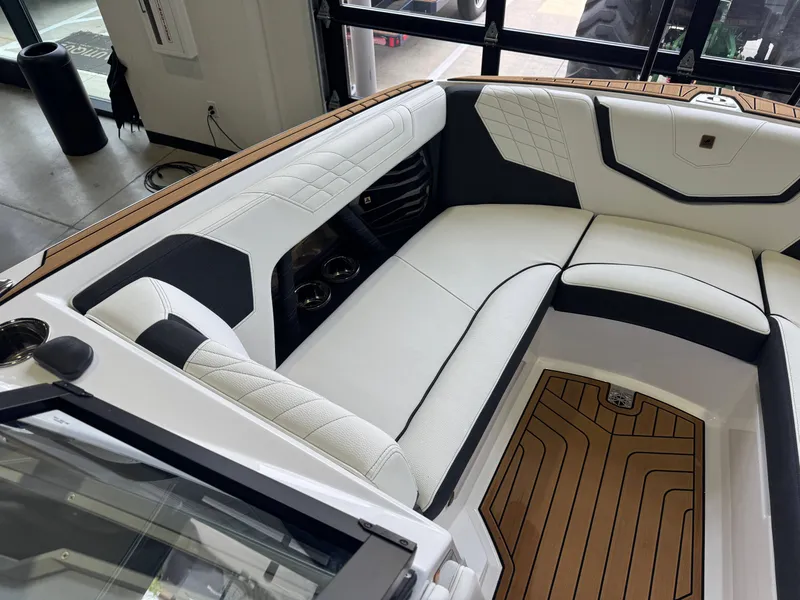 Slide: The Image of Interior of 2023 Nautique Super Air Nautique G23 with luxurious seating. - 18