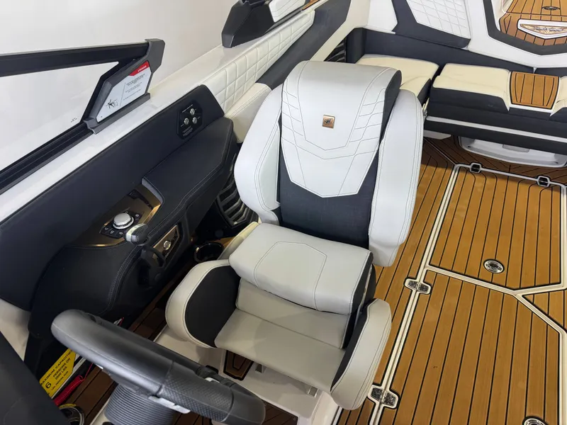 Slide: The Image of Interior of 2023 Nautique Super Air Nautique G23 with luxurious seating design. - 20