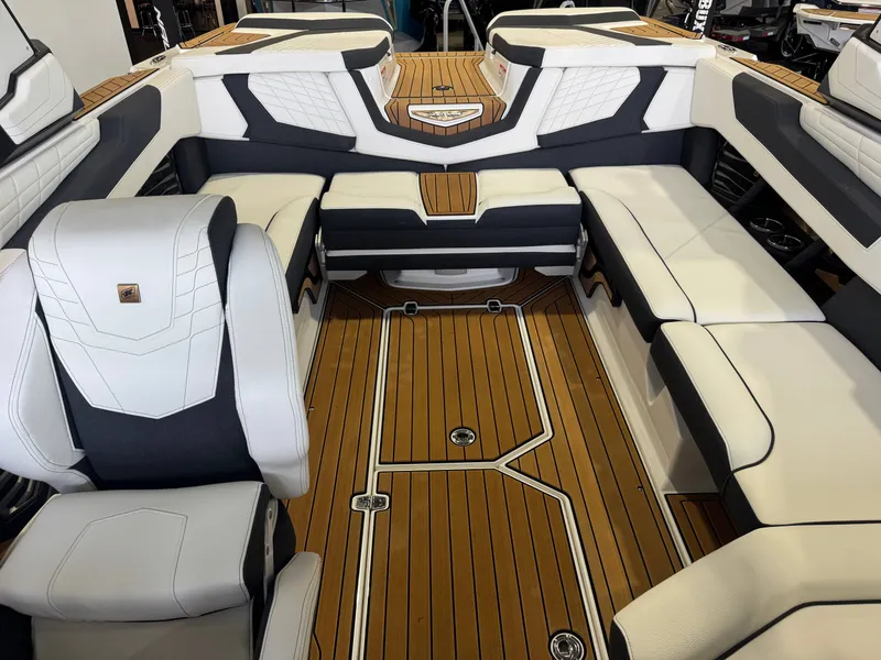Slide: The Image of Interior of 2023 Nautique Super Air Nautique G23 with luxurious seating. - 21