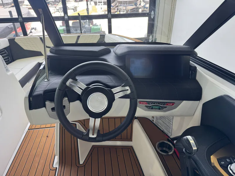 Slide: The Image of Interior view of 2023 Nautique Super Air Nautique G23 cockpit. - 25
