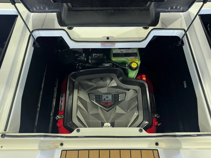 Slide: The Image of Engine compartment of 2023 Nautique Super Air Nautique G23 boat. - 27