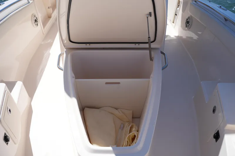 Slide: The Image of Open storage compartment on 2025 Grady-White 281 Coastal Explorer boat. - 38
