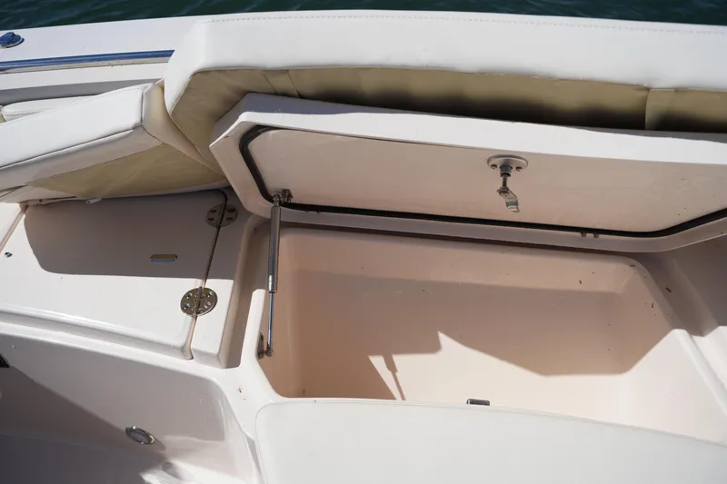 Slide: The Image of Open storage compartment on 2025 Grady-White 281 Coastal Explorer boat. - 41