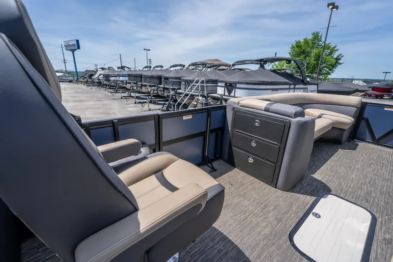 Slide: The Image of 2026 Viaggio X24U pontoon boat interior with luxurious seating and storage drawers. - 28