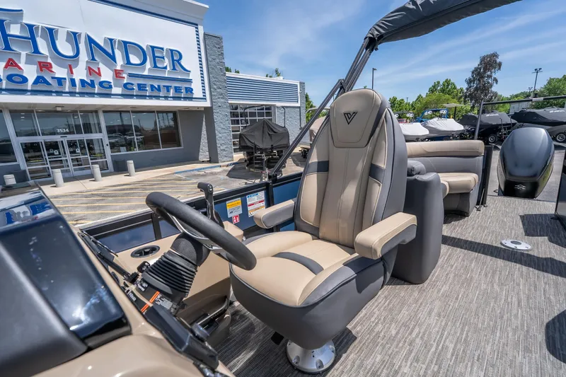 Slide: The Image of 2026 Viaggio X24U boat at Thunder Marine Boating Center, featuring luxurious captain's chair. - 30