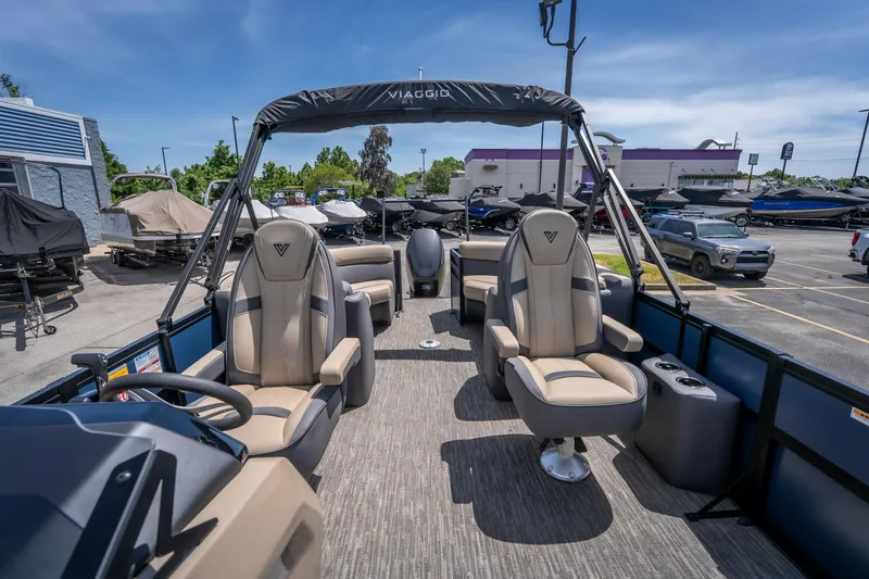 Slide: The Image of Luxurious 2026 Viaggio X24U pontoon boat interior with plush seating and modern design. - 31
