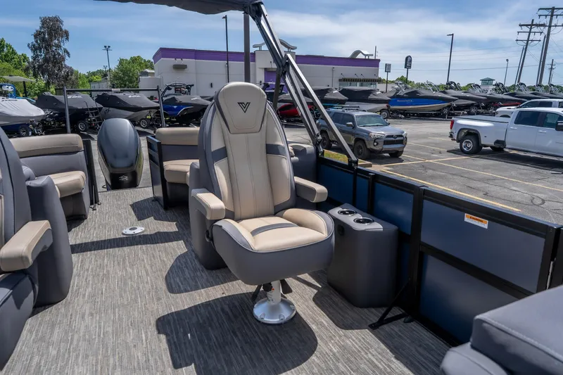 Slide: The Image of Luxurious seating on 2026 Viaggio X24U boat, showcasing modern design and comfort in a dealership setting. - 32