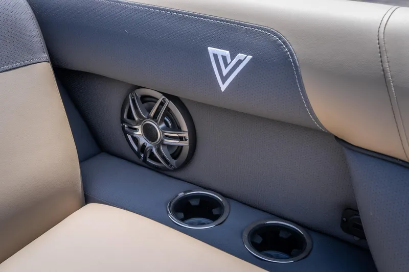 Slide: The Image of 2026 Viaggio X24U interior with speaker and cup holders, featuring sleek design elements. - 35