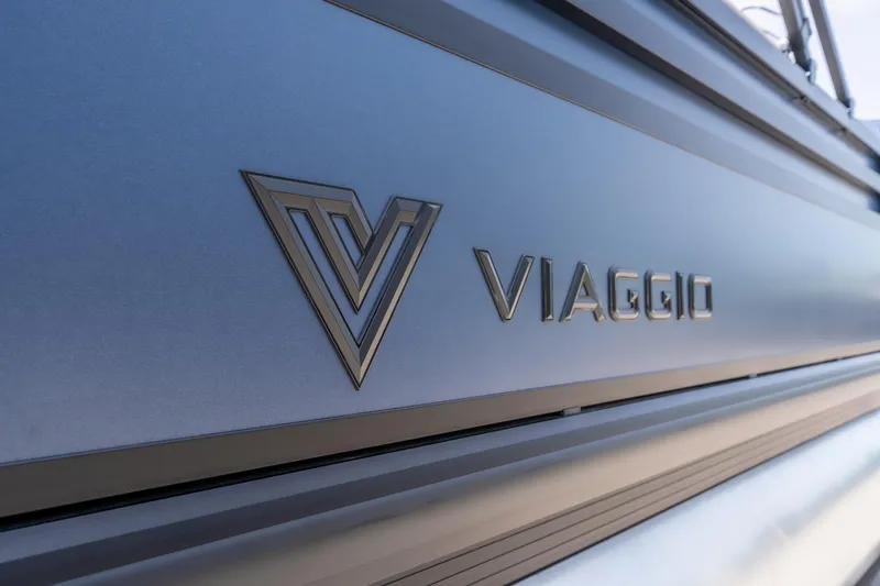 Slide: The Image of 2026 Viaggio X24U logo on sleek metallic surface, showcasing modern design. - 9