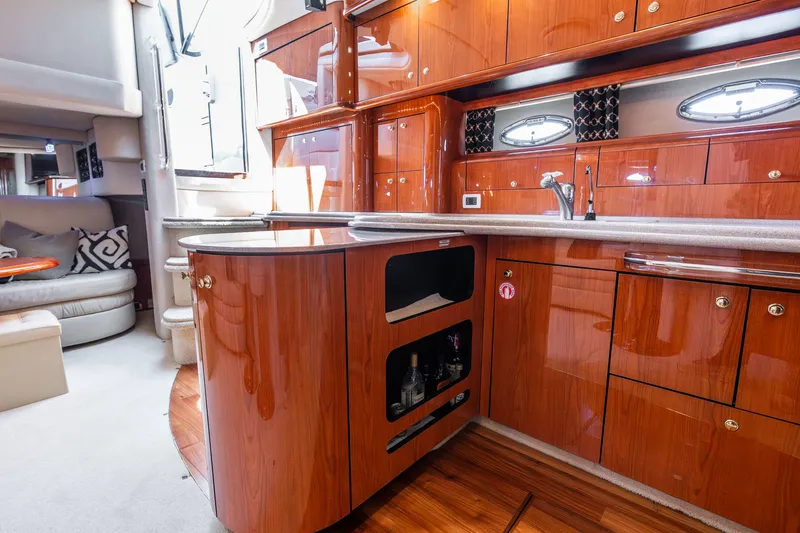 Slide: The Image of Interior of 2001 Sea Ray Sundancer 510 yacht with elegant wood finish. - 47