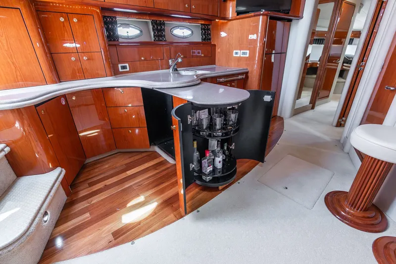 Slide: The Image of Interior of 2001 Sea Ray Sundancer 510 yacht with elegant wood finish. - 48