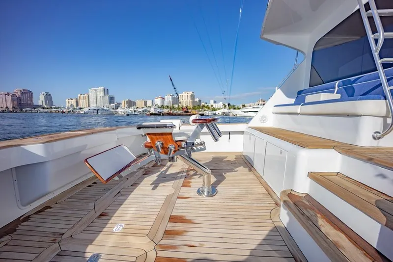Slide: The Image of Luxurious 2003 Viking 65 EB yacht deck with city skyline view. - 12