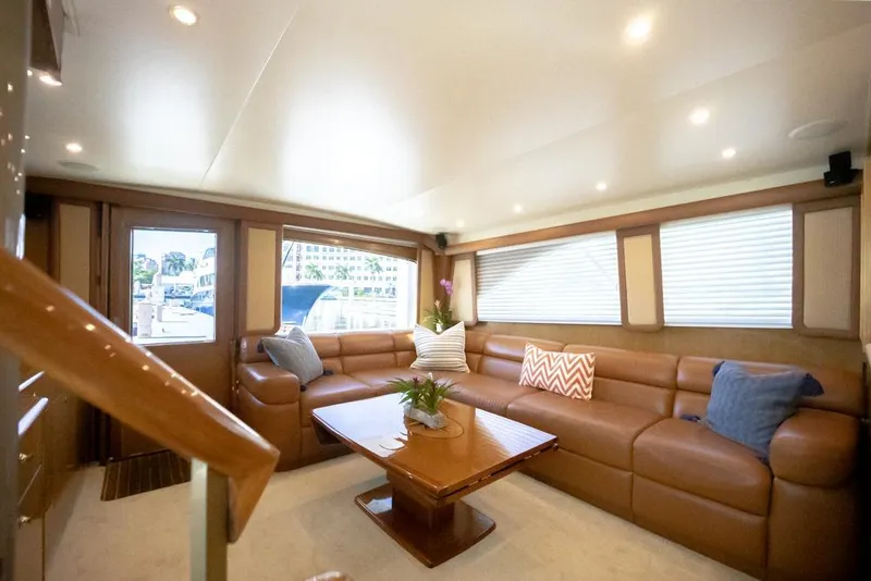 Slide: The Image of Luxurious interior of 2003 Viking 65 EB yacht with leather seating and elegant decor. - 41