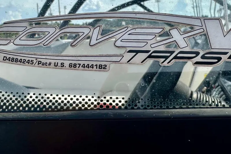 Slide: The Image of Close-up of 2012 Tigé R20 Convex V TAPS windshield with patent details. - 10