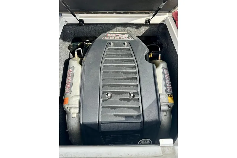 Slide: The Image of 2012 Tigé R20 engine compartment showcasing powerful inboard motor. - 15