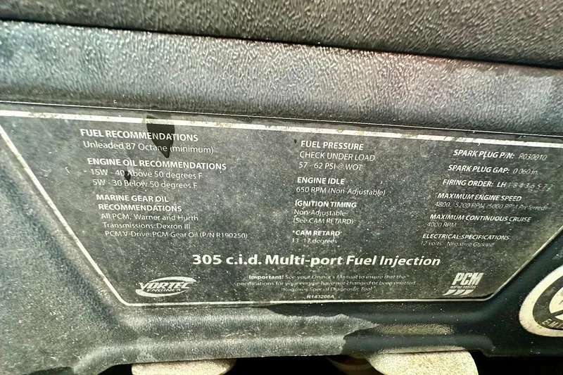 Slide: The Image of 2012 Tigé R20 engine specifications label detailing fuel, oil, and maintenance recommendations. - 17