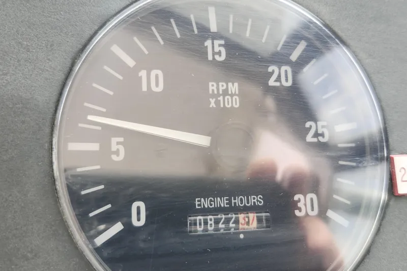 Slide: The Image of Close-up of Tiara Yachts 3100 Open 2000 tachometer showing RPM and engine hours. - 20