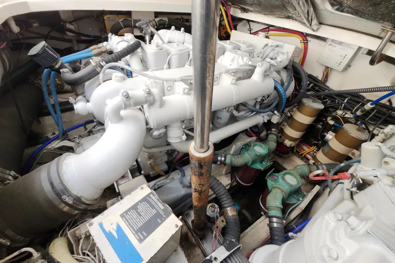 Slide: The Image of Engine compartment of a 2000 Tiara Yachts 3100 Open, showcasing detailed mechanical components. - 28