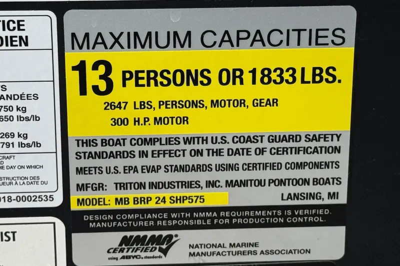 Slide: The Image of Manitou EXPLORE 24, 2025 model, maximum capacity: 13 persons or 1833 lbs, 300 HP motor. - 29