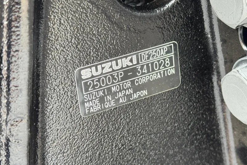 Slide: The Image of Label on Suzuki motor, model DF250AP, made in Japan, on Manitou EXPLORE 24, 2025. - 8