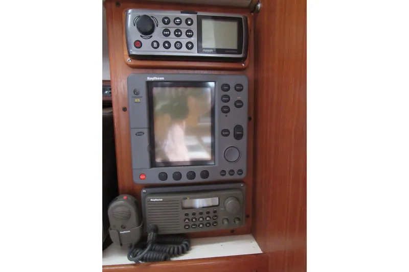 Slide: The Image of Navigation and communication equipment on a 1999 Catalina 380 sailboat. - 32
