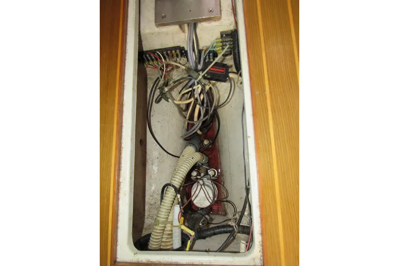 Slide: The Image of Electrical wiring and components inside a 1999 Catalina 380 sailboat. - 45
