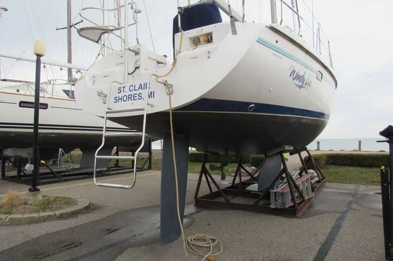 Slide: The Image of Catalina 380 sailboat from 1999 on dry dock in St. Clair Shores, MI. - 5