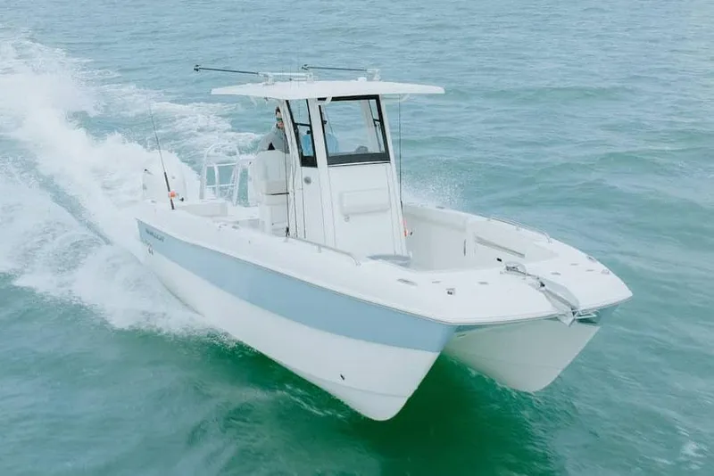 The Image of Manufacturer Provided Image: 2026 World Cat 235 TE boat cruising on open water. - 0