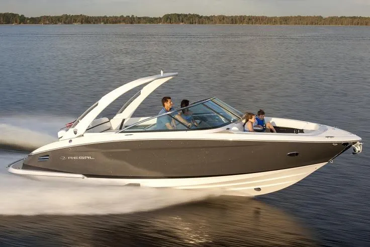 Slide: The Image of Manufacturer Provided Image: 2017 Regal 2800 Bowrider cruising on a lake with passengers. - 4