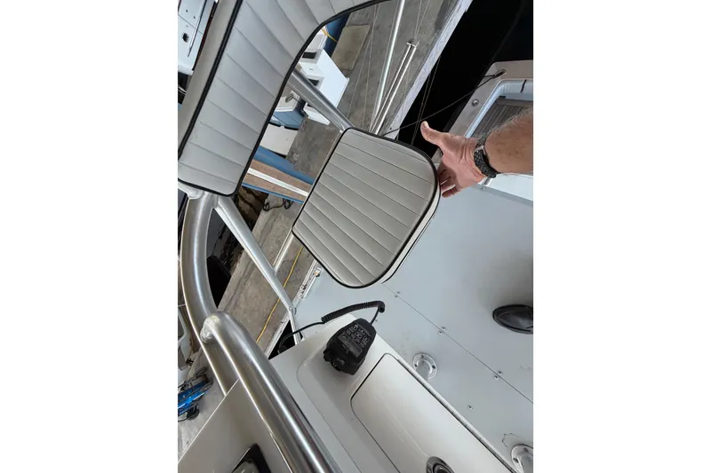 Slide: The Image of 2024 Strike 29 FT Center Console with Cuddy, featuring sleek seating and modern design. - 19