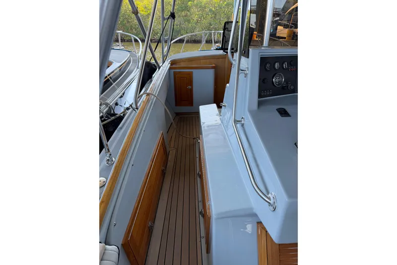 Slide: The Image of 2024 Strike 29 FT Center Console with Cuddy, featuring sleek deck and modern controls. - 24