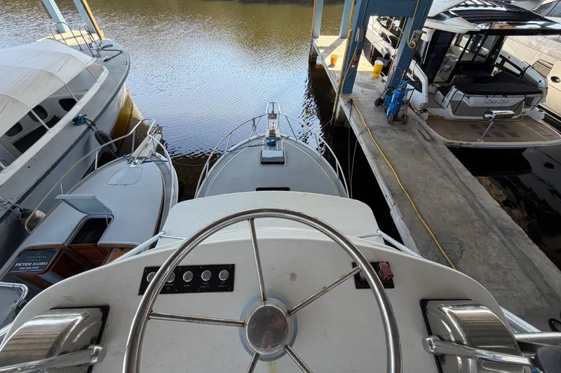 Slide: The Image of Engine compartment of 2024 Strike 29 FT Center Console boat, showcasing dual engines. - 30