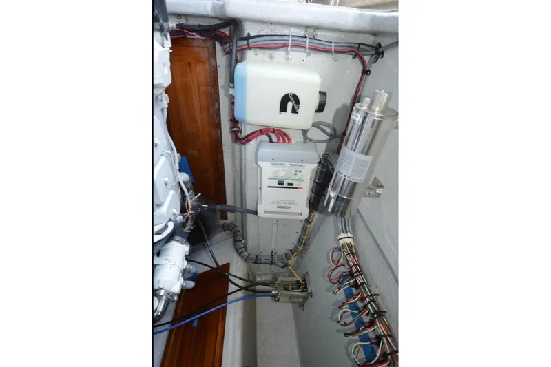 Slide: The Image of 2024 Strike 29 FT Center Console with Cuddy, docked, showcasing sleek design and spacious deck. - 34