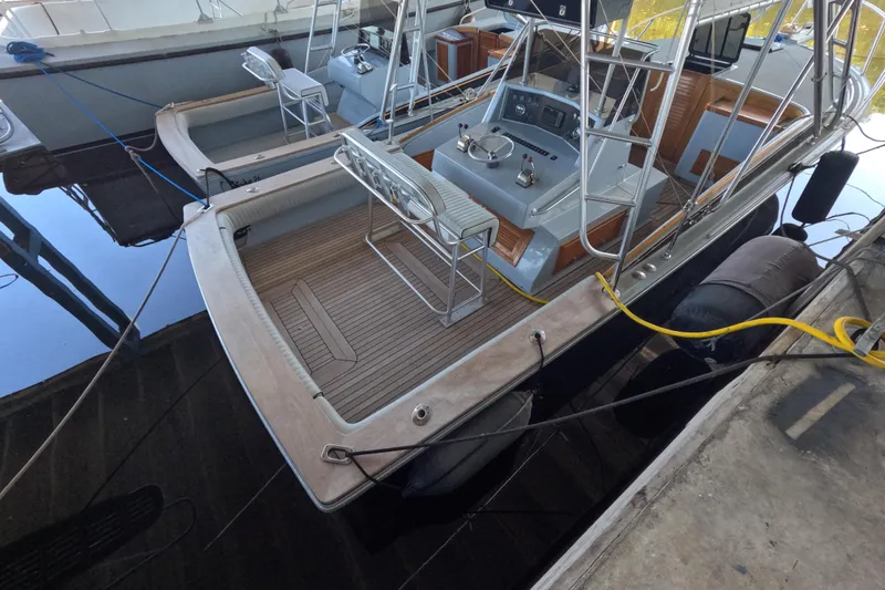 Slide: The Image of 2024 Strike 29 FT Center Console with Cuddy, docked, showcasing sleek design and spacious interior. - 36