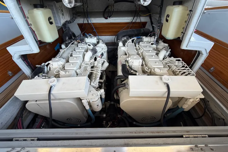 Slide: The Image of 2024 Strike 29 FT Center Console boat engine compartment with dual engines. - 4