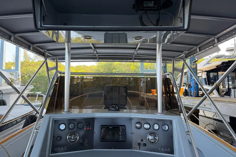 Slide: The Image of 2024 Strike 29 FT Center Console with Cuddy docked in a marina. - 43