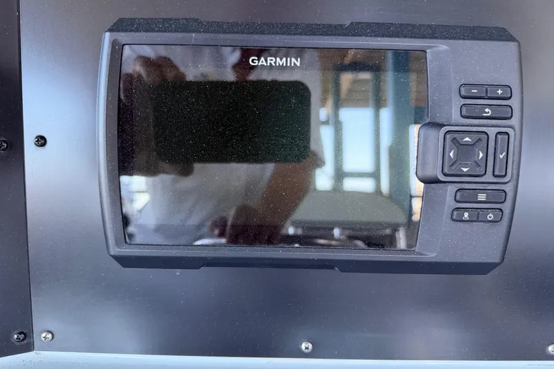 Slide: The Image of Garmin navigation system on 2024 Strike 29 FT Center Console boat. - 9