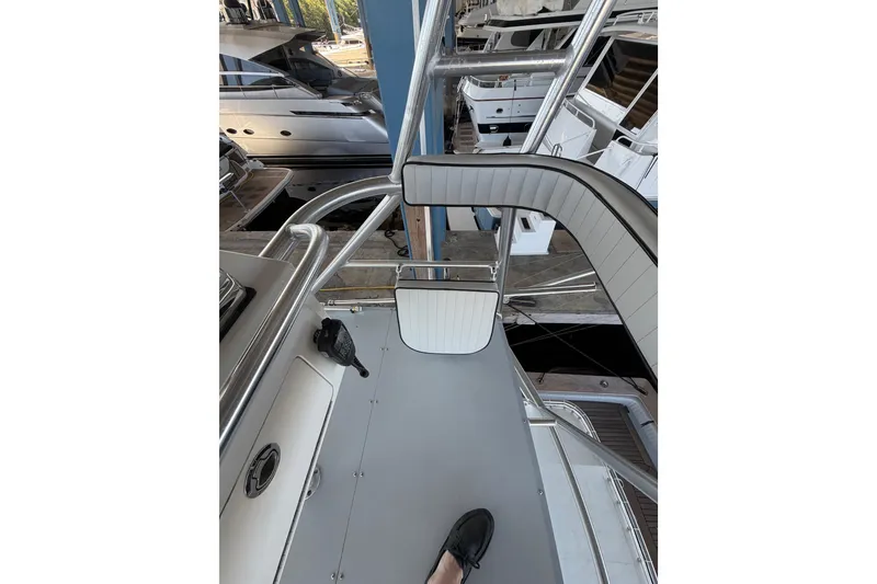 Slide: The Image of 2024 Strike 29 FT Center Console with Cuddy, docked in marina, top view. - 18