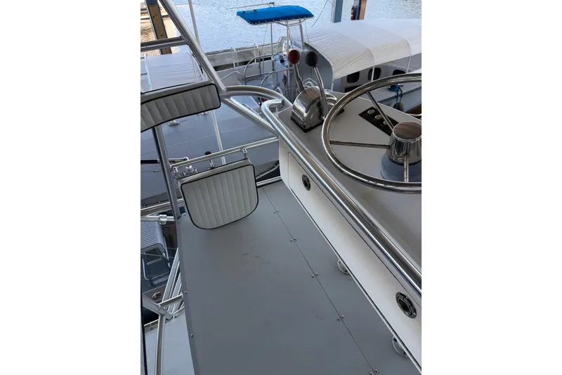 Slide: The Image of 2024 Strike 29 FT Center Console with Cuddy, featuring helm and steering wheel. - 20