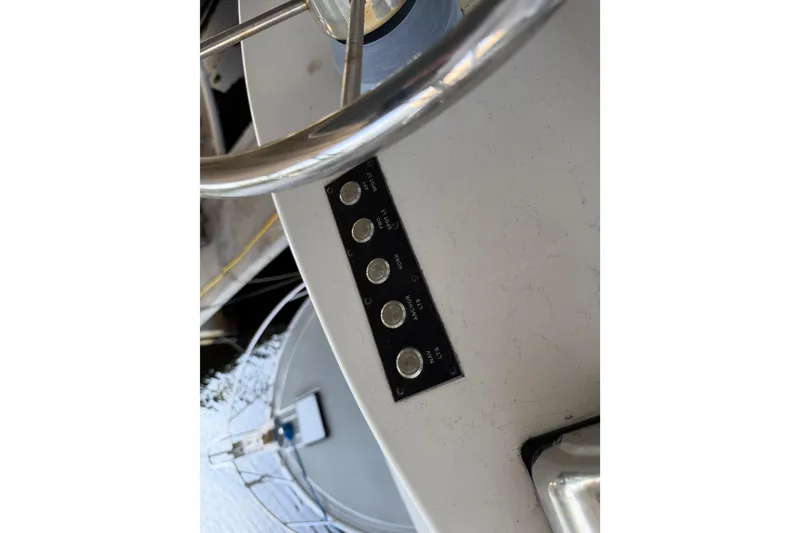 Slide: The Image of 2024 Strike 29 FT Center Console with Cuddy, featuring sleek interior and control panel. - 23