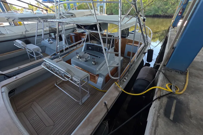 Slide: The Image of 2024 Strike 29 FT Center Console with Cuddy, docked in a marina. - 37