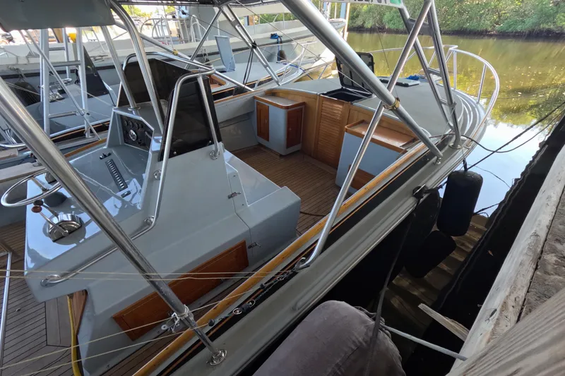 Slide: The Image of 2024 Strike 29 FT Center Console with Cuddy, docked on calm water. - 38