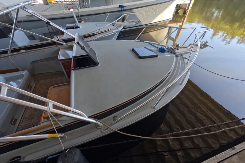 Slide: The Image of 2024 Strike 29 FT Center Console boat helm with steering wheel and control panel. - 40