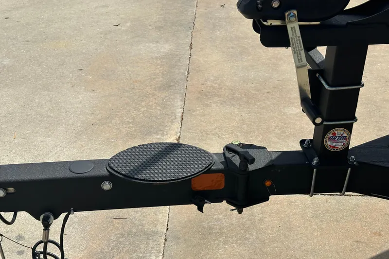 Slide: The Image of Trailer hitch of a 2023 Nitro Z19 boat on a concrete surface. - 13