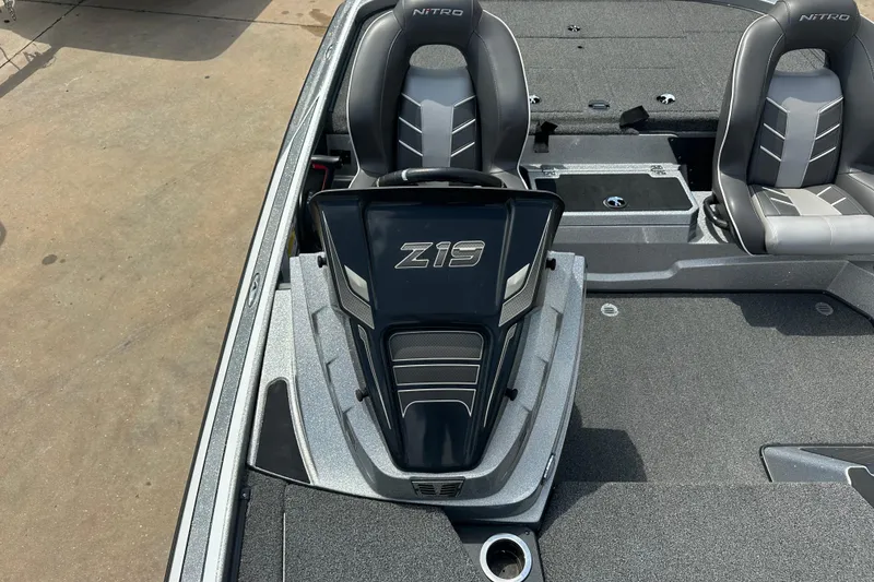 Slide: The Image of 2023 Nitro Z19 boat interior with dual seats and steering console. - 8