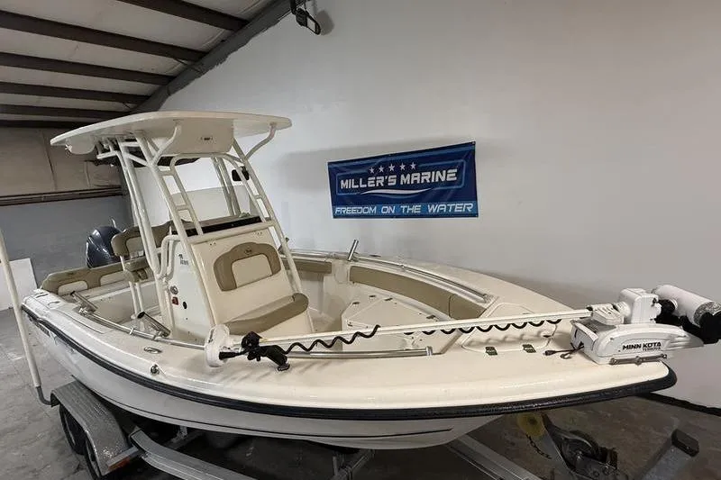 Slide: The Image of 2018 Key West 219 FS boat on trailer at Miller's Marine showroom. - 2