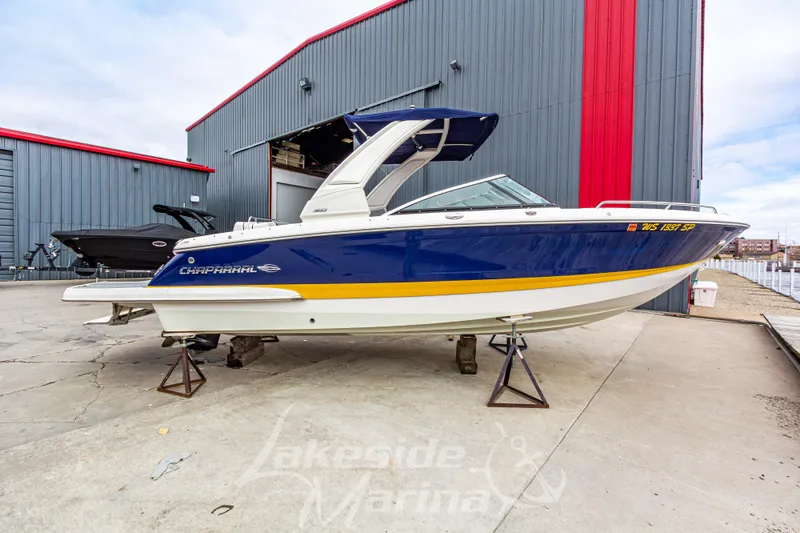 Slide: The Image of 2021 Chaparral 267 SSX boat displayed at Lakeside Marina. - 2