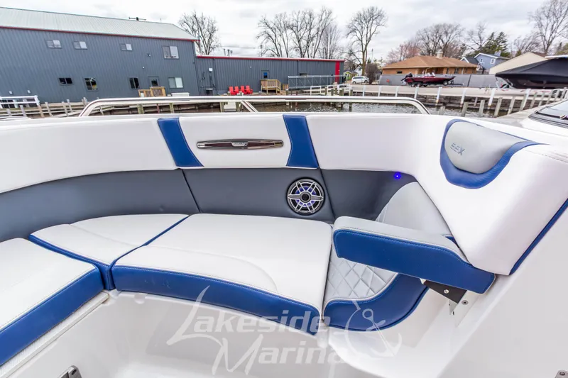 Slide: The Image of Interior of 2021 Chaparral 267 SSX boat with blue and white seating. - 33
